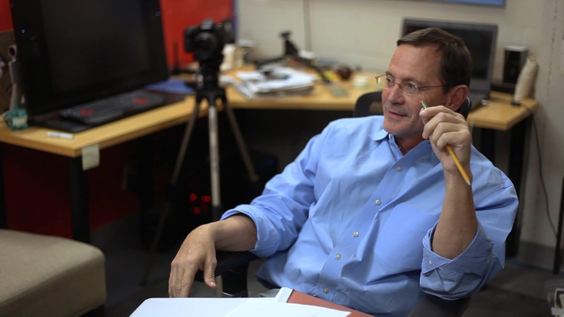 bil watson at desk Bil Watson compares Brighter Image Lab vs cosmetic dentist reviews