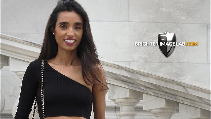 International model smiles with Press On Veneers from Brighter Image Lab